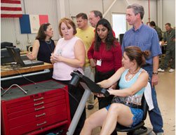 Image of person on bicycle with electrocardiogram on