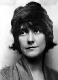Photo of Susan Glaspell. She has dark hair and brown eyes.