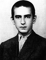 Elie Wiesel as a young man in a black and white photo.