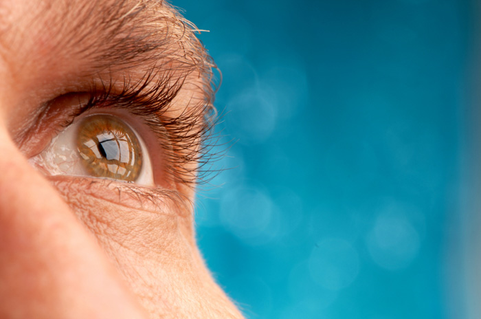 Image of an eye whose unblinking gaze expresses insight and understanding.