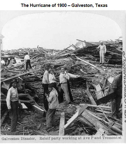 Image of several men standing on layers of debris from the hurricane