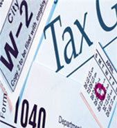 Image of a collage of tax related items