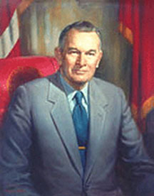 Portrait of Bill Clements, seated