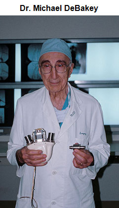 Image of Michael DeBakey holding an artificial heart