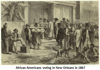 A group of African Americans approaching a table with a ballot box on it.