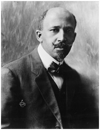 A portrait of a man in a three-piece suit and a bowtie with a curled mustached and goatee.
