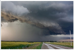 Image of dark clouds approaching the countryside moving in an eastward direction.