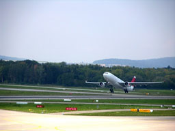 Image of an airplane taking off from a runway