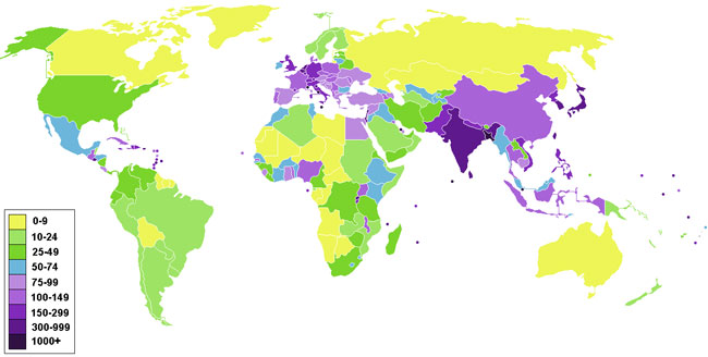 The image is a world density map that has a color scale that indicates the number of people per square kilometers. The darker areas have more people living within a square kilometer than the lighter shaded area.