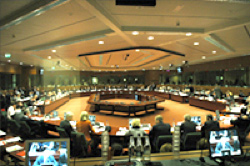 Image of the inside of the meeting room of the council of the European Union.