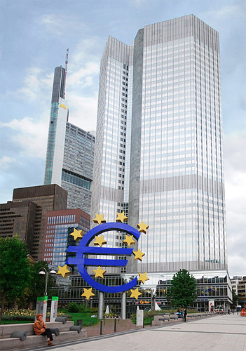 Image of the European Central Bank, in Frankfurt, Germany. There is a E.U. symbol on the front of the photo