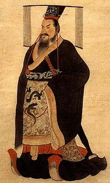Image of Qin Shi Huang standing and dressed in traditional robe.