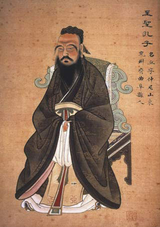 A painting of Chinese philosopher Confucius. He is an older man seated on a chair wearing traditional Chinese robes with a moustache and long beard.