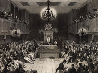 A drawing of the interior of the British House of Commons with all members present.