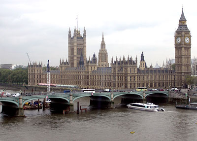 A view of the Palace at Westminster from the Thames river which shows Westminster bridge.