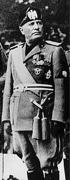 A photograph of Benito Mussolini in uniform. He is a rotund man in middle age.