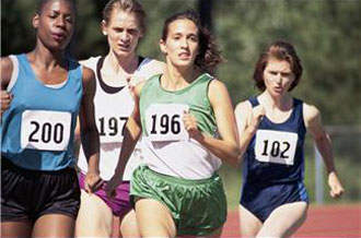 Image shows 4 women running a race.