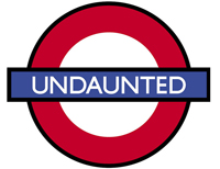 A graphic of a red circle with a blue bar across it; inside the blue bar is the word “undaunted.”