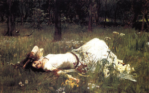 A painting of the character Ophelia form William Shakespeare's Hamlet. She is a young woman lying in a field with a sad look on her face.