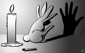 A drawing of a rabbit standing in front of a candle making a shadow of a hand upon the wall
