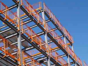 A photograph of a building frame constructed of steel beams