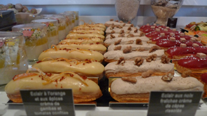 A photograph of rows of pastries in a bakery