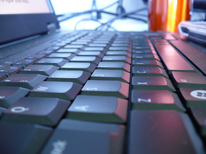 A photograph o f a laptop computer keyboard.