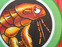 A cartoon of a huge, angry-looking flea