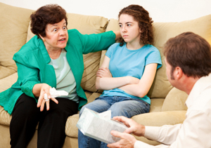 Two parents talking over their daughter, almost as if she wasn’t in the room with them. 