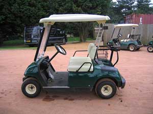 image of a green golf cart