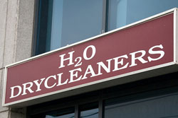 Store sign that reads: “H2O Drycleaners”