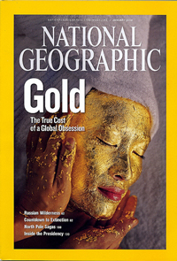 A National Geographic Magazine cover featuring a woman with her face painted in Gold.