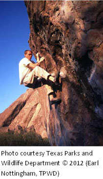 rock climber at Hueco Tanks State Park near El Paso, Texas