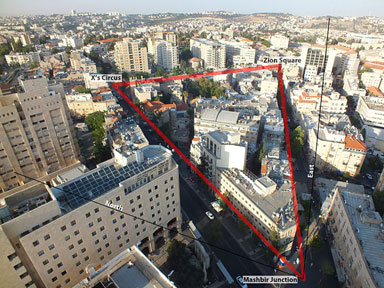 Ariel view of Jerusalem with streets intersecting in a triangle.