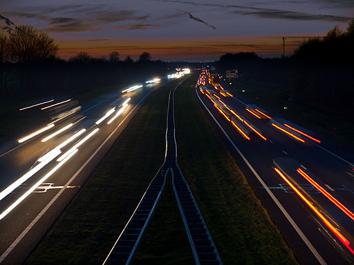 Time-elapsed photo of cars on a highway