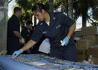 Image is of dental instruments being prepared for sanitization