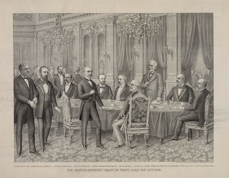 the signing of the Treaty of Peace. Five men are seated at a large table and five are standing
