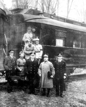 Various High Command from World War I standing outside the train where they signed the armistice ending World War I