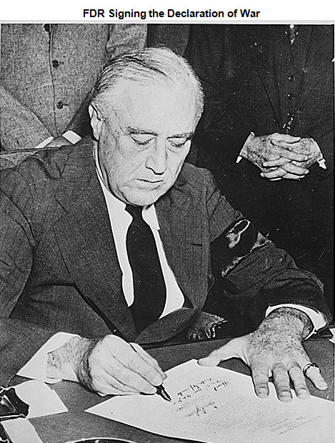 Image of Roosevelt seated, and signing a document