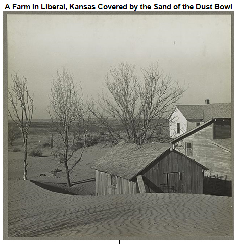 Image of three housing structures surrounded by mounds of sand