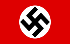 A Nazi flag: It is a field of red with a circular white center that has a black swastika imposed on it.
