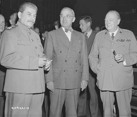 A photograph of Joseph Stalin, Harry Truman and Winston Churchill at the Potsdam Conference.