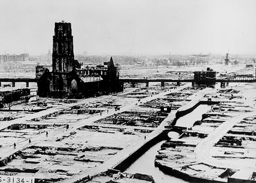 Image of post-WWII Berlin, Germany. All buildings are destroyed with the exception of a church.