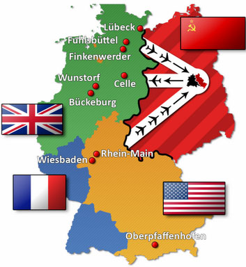 Image of a map of Germany that is divided by the allied power that has taken control; each of those sections is represented by the flag of the controlling country. The region where Berlin is located is represented by airplane symbols and a sub map that illustrates a division of the city.