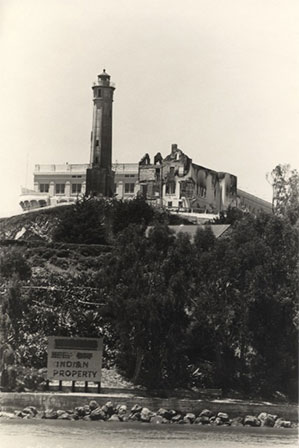  Image of Alcatraz Island with a building and watchtower on top