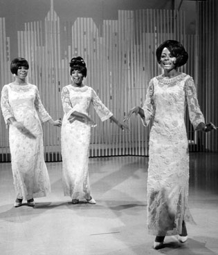 Image of musical groups, The Supremes. singing (from left to right, Florence Ballard, Mary Wilson, and Diana Ross)