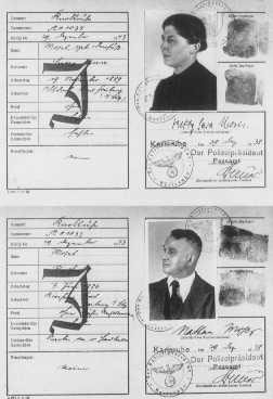Image of passports of a Jewish couple, each stamped with a 'J'.